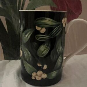 Dunoon Christmas mug featuring a mistletoe design by Caroline Bessey.